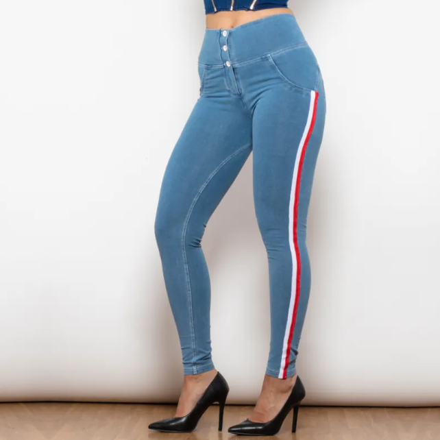 Blue jeans with red and white stripes on a plain background