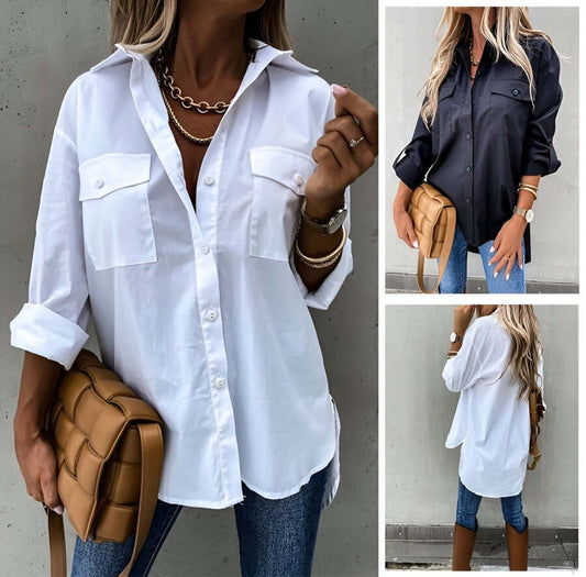 White button-up shirt worn by a person with a neutral background