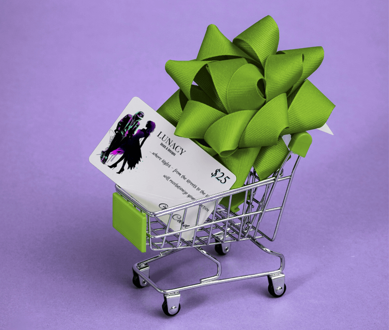 a gift card in a tiny shopping cart with a bow on it 