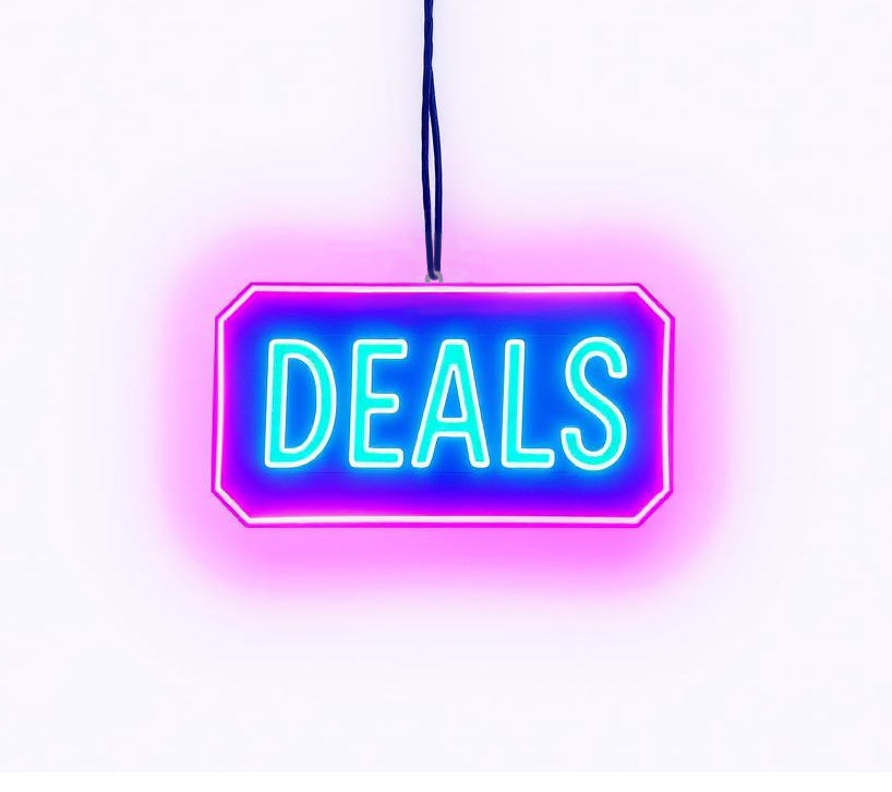 A neon sign hanging from a string that says 'Deals'