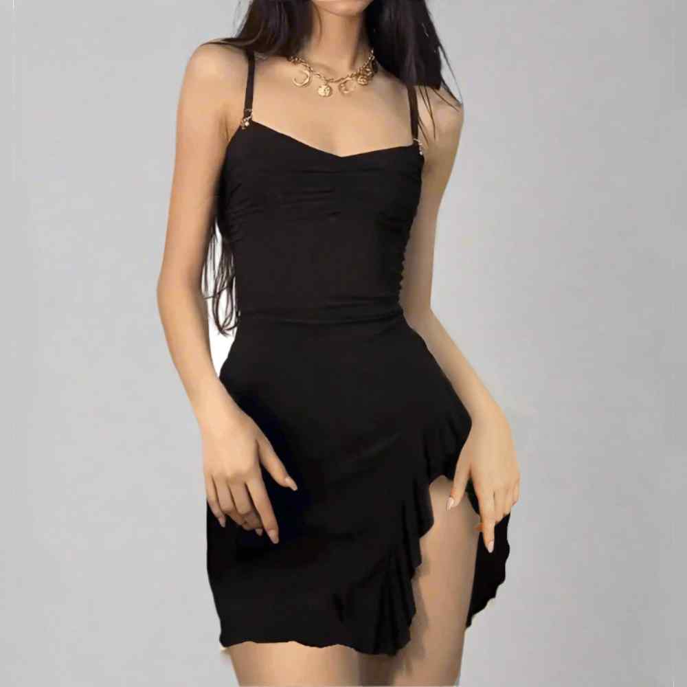 Black dress worn by a model on a plain background