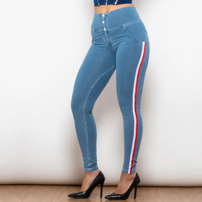 Blue jeans with red and white stripes on a plain background
