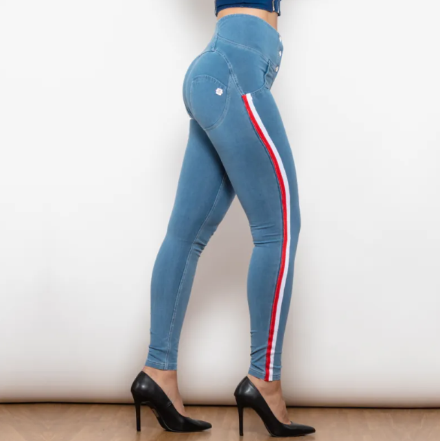 Blue leggings with red and white stripes worn by a person on a plain background