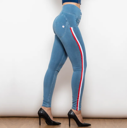 Blue leggings with red and white stripes worn by a person on a plain background