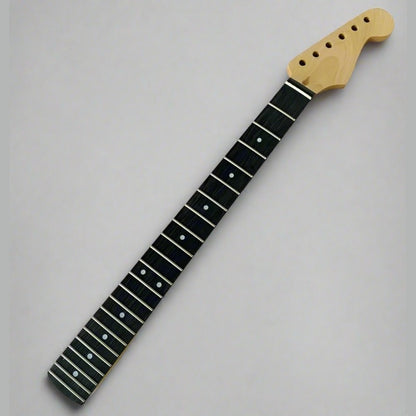 Guitar neck with black fretboard and white dot inlays on a gray background