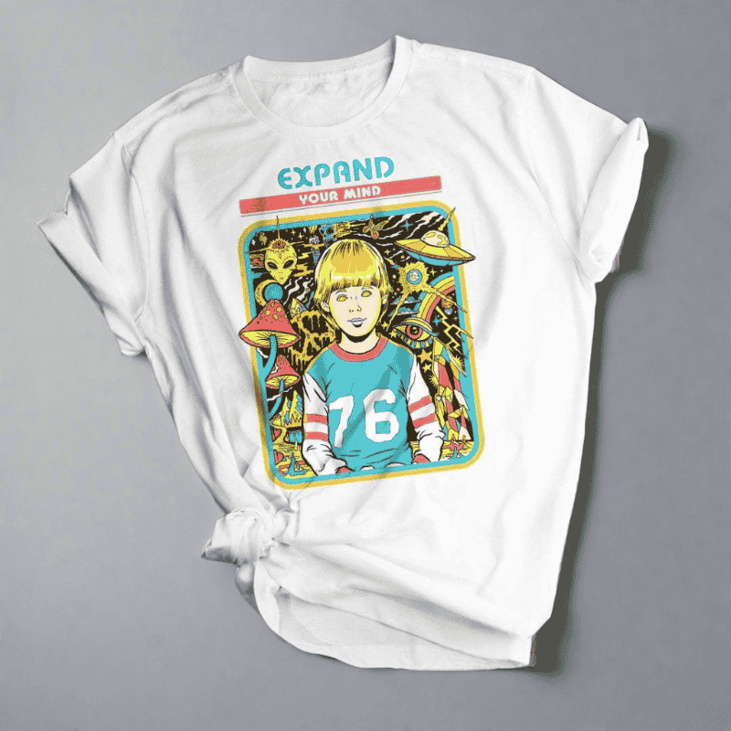 White t-shirt with graphic design featuring a person with '76' on a gray background