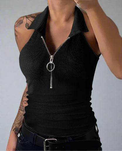 Woman wearing a black zip-up top