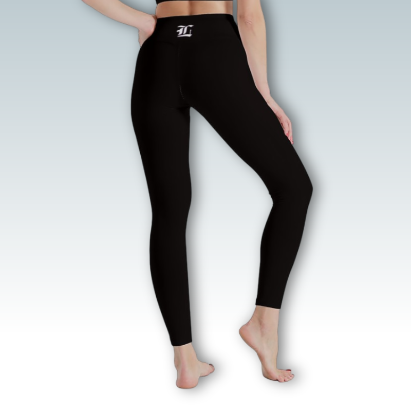Black leggings with a logo on a gray background