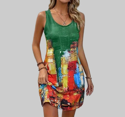 Woman wearing a green sleeveless dress with colorful abstract pattern against a white background